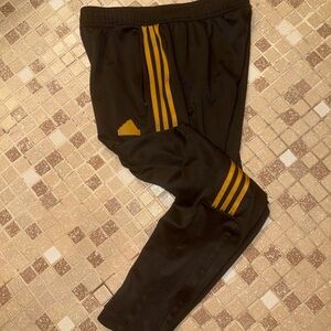 adidas Black Joggers with Gold Stripe Details